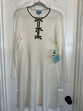 CeCe Cream Knit Dress with Black Trim and Bow Details